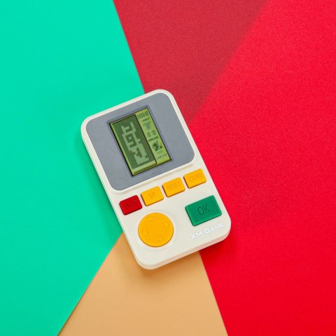 Gra zręcznościowa elektroniczna konsola retro gierka przenośna kieszonkowa biała Kik Sp. z o. o. Sp. k.